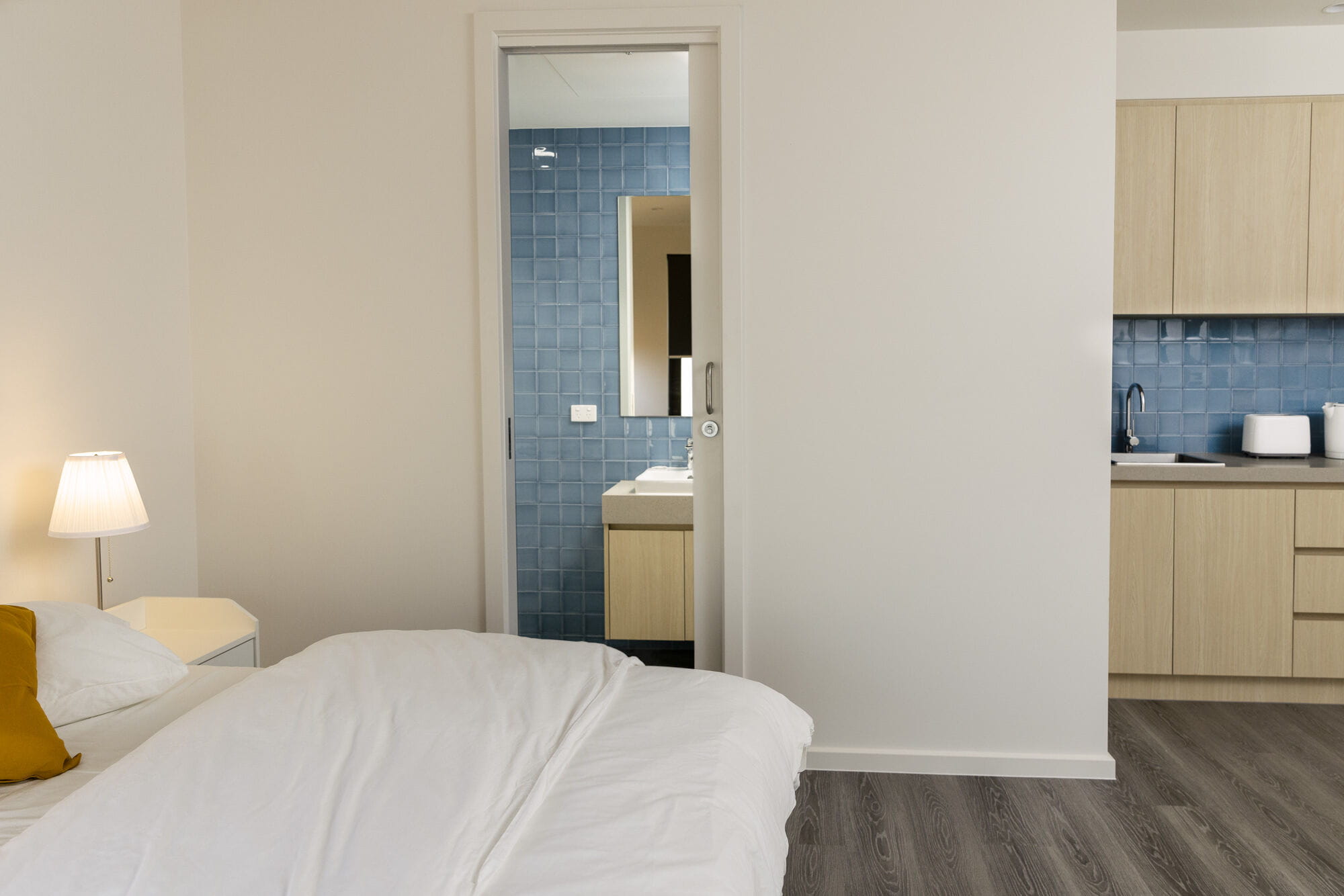 bed bathroom kitchenette