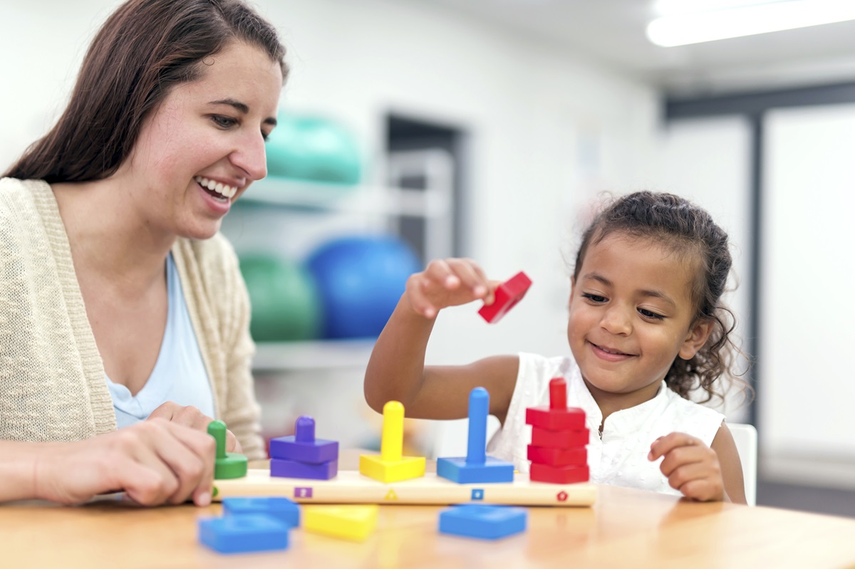 Early childhood intervention client engages in occupational therapy