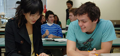 A photo showing a teacher and student