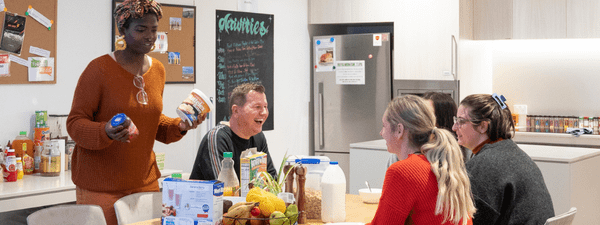 group of teenagers having lunch