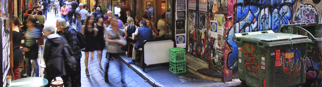 People walking through an alley way in Melbourne's CBD