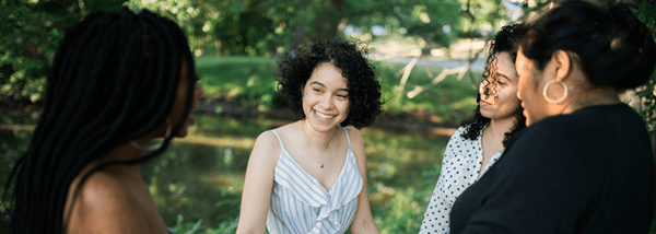 women outside smiling