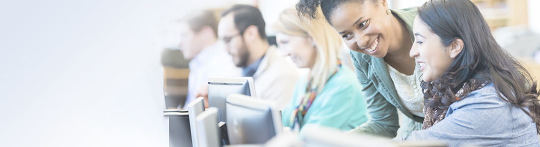 A group of young people working on computers