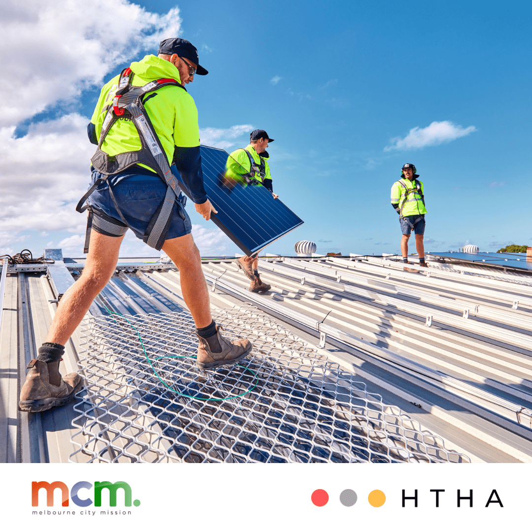 Homes Hub Trades Australia workmen installing solar panels. 