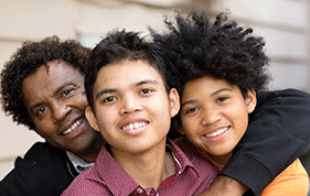 Dad and two young sons