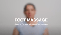 blurred woman in background with text "foot massage" over the top