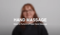 blurred woman in background with the text "hand massage steps to perform a proper hand massage" written over the top